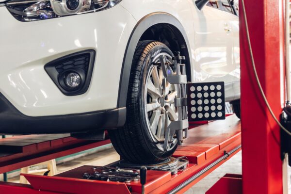 Car wheel centering machine adjustment.